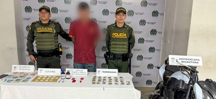 Detenido sujeto cuando iba en una moto llevando marihuana y cocaína